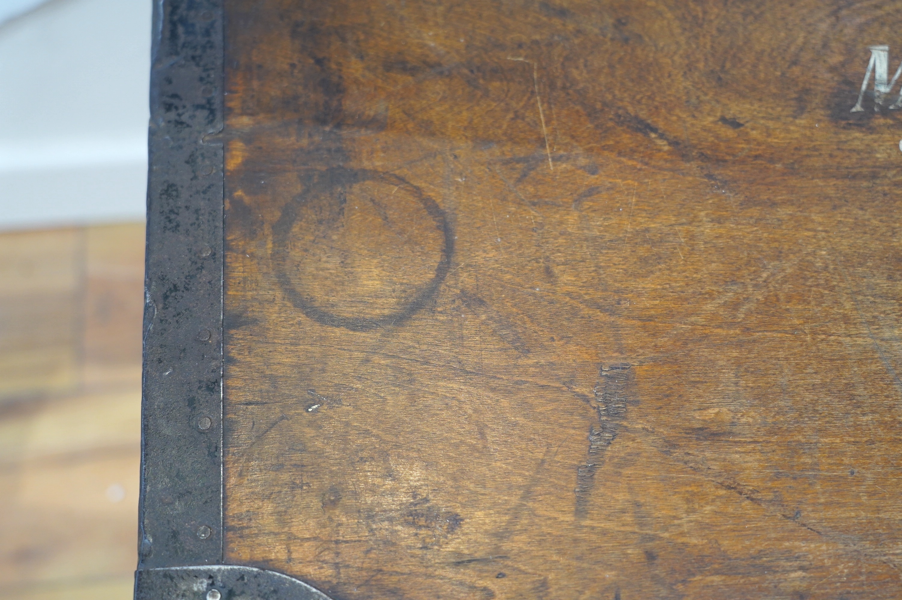 A pine military trunk with steel banding to all edges and corners, and original tin lining, owner’s name painted to the lid; ‘Major W.H. Postle R.A.O.C.’, 91.5cm wide, 54cm deep, 53cm high. Condition - fair to good